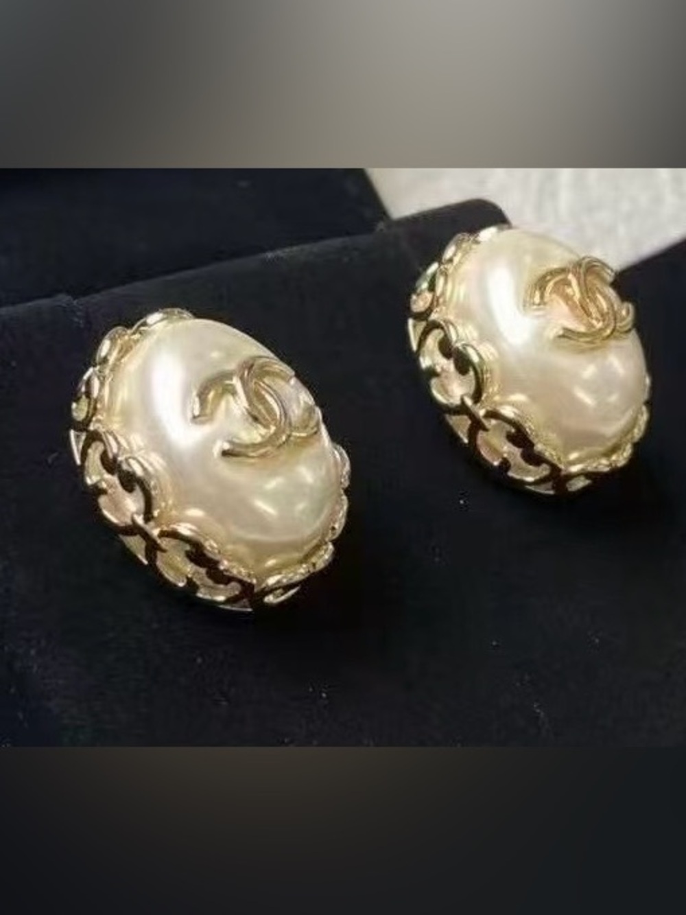 CHANEL Pearl Gold tone  Logo Stud Earrings barely used new condition.